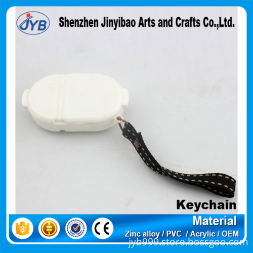 hot sale new design plastic custom oval pills drug case box keyring